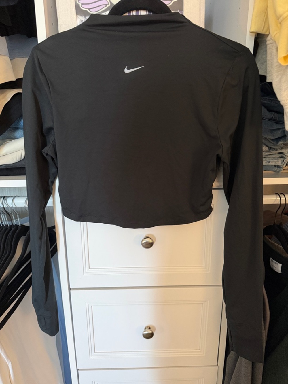 Nike Black Long-Sleeve Cropped Athletic Top with Reflective Swoosh